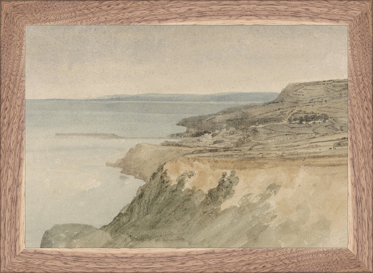 Framed Cliff. Frame: Natural Walnut. Paper: Rag Paper. Art Size: 7x10. Final Size: 8'' X 11''